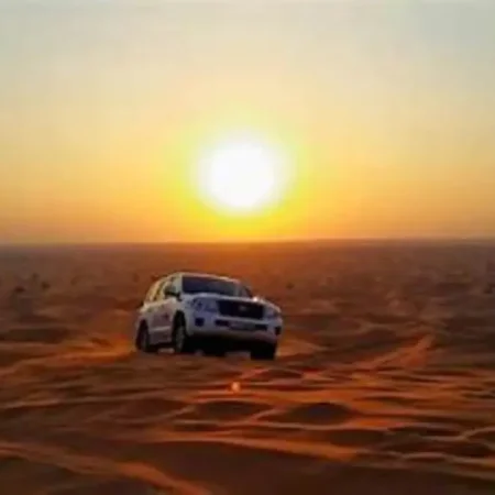 From Dubai Shared Evening Desert Safari Tour with Quad Bike and Camel ride