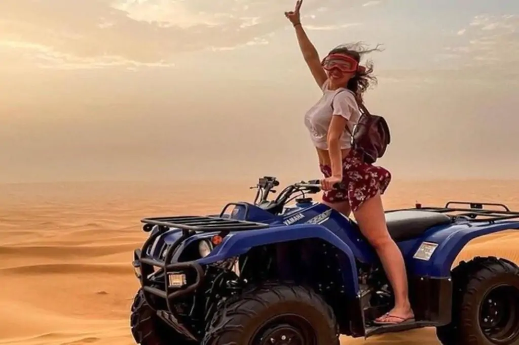 From Dubai Shared Evening Desert Safari Tour with Quad Bike and Camel ride